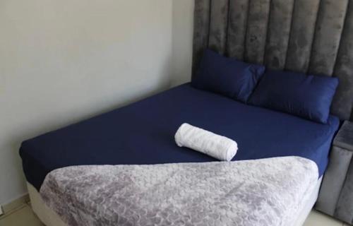 Postel nebo postele na pokoji v ubytování La Ndjolinoise