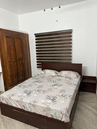 Niharika Homestayにあるベッド