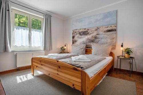 Postel nebo postele na pokoji v ubytování Ferienwohnung Ostseezeit