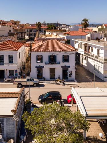 an aerial view of a city with a parking lot at Andy Port House with Seaview by Goutos Properties in Ermioni