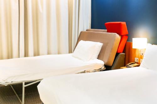 Postel nebo postele na pokoji v ubytování Holiday Inn Express Harlow by IHG