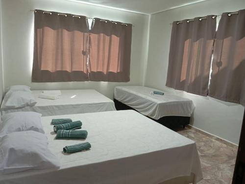 Postel nebo postele na pokoji v ubytování Quartos pra hospedagem em Maragogi