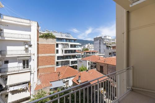 a view from the balcony of a building at Celine Volos by halu! Cozy apartments in the center in Volos