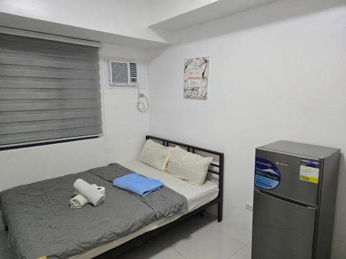 Giường trong phòng chung tại Grand Riviera Suites