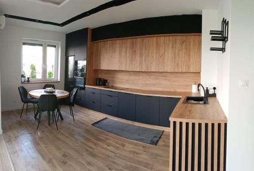 Kuchyň nebo kuchyňský kout v ubytování PREMIUM Apartaments