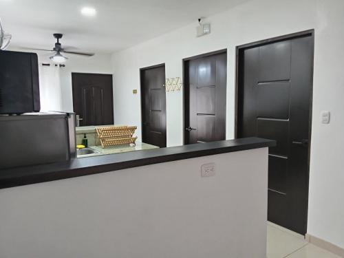 Η κουζίνα ή μικρή κουζίνα στο cr.arenalapartments#1..hermoso,cómodo con parqueo