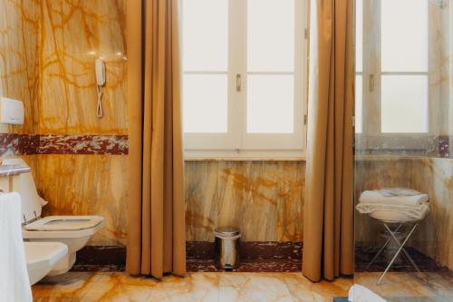 Hotel Palazzo Guiscardo Pietrasantaにあるバスルーム