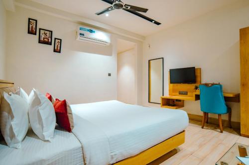 Ένα ή περισσότερα κρεβάτια σε δωμάτιο στο Aceotel Premier TK, Morbi