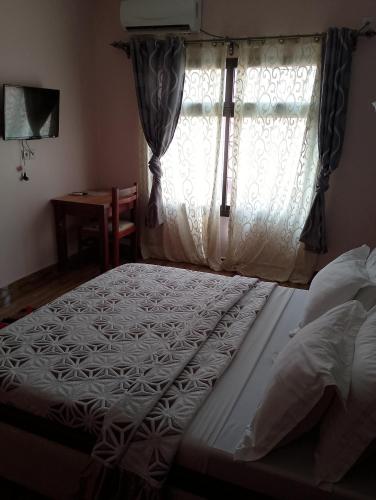 Postel nebo postele na pokoji v ubytování Inno Group Hotel