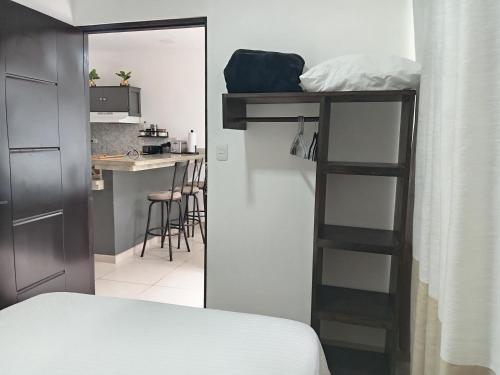 Η κουζίνα ή μικρή κουζίνα στο cr.arenalapartments#1..hermoso,cómodo con parqueo