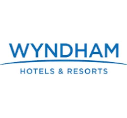 awwamn hotels and resorts logo on a white background at Travelodge by Wyndham Bainbridge in Bainbridge