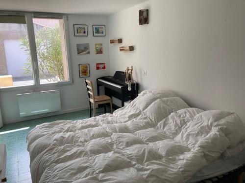 Postel nebo postele na pokoji v ubytování Maison familiale aux Sables d'Olonne - 5 chambres