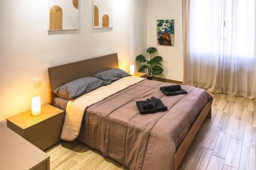 Postel nebo postele na pokoji v ubytování Inalpi Arena Modern Suite