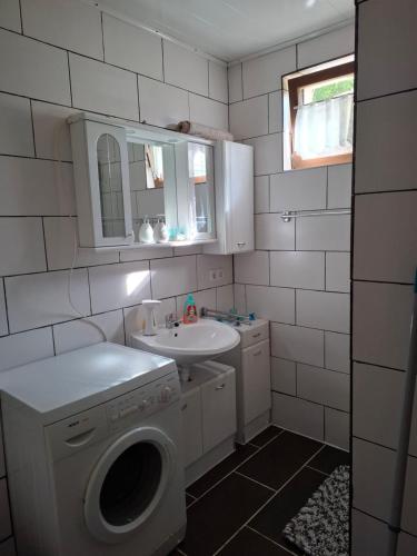 Ένα μπάνιο στο Ferienhaus Hochwald