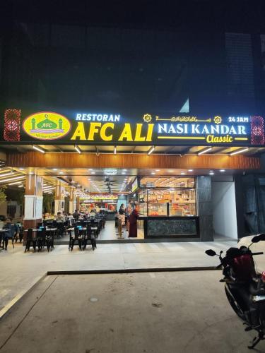 an arfc all majkat restaurant at night at Umi SplashMania homestay in Banting