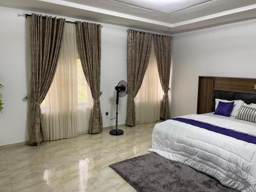 Postel nebo postele na pokoji v ubytování Global Premium Apartments