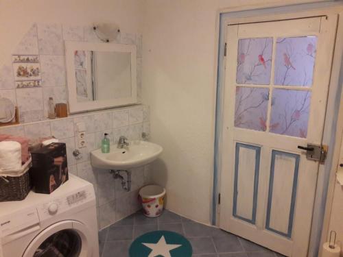 Ένα μπάνιο στο Ferienwohnung Sternenhof