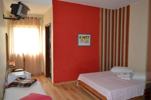 Ένα ή περισσότερα κρεβάτια σε δωμάτιο στο Hotel Pousada Icaraí