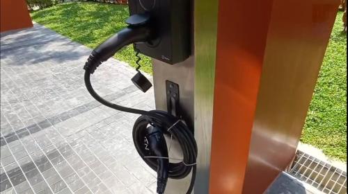 a pay phone with a cord plugged into it at Kave Embryo Pathum Thani Luxurious Condo in Ban Lam Phak Kut