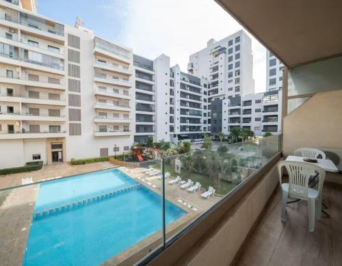 La alberca dentro o cerca de Charming Studio for Rent with Pool Access & Kids Playground