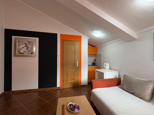 a living room with a couch and a table at Markovic Aparthotel - Budva Becici Hotel in Becici