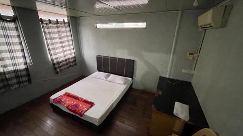 Postel nebo postele na pokoji v ubytování Hostel 59