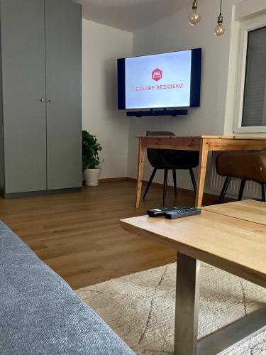 Télévision ou salle de divertissement dans l'établissement Geidorf Residenz - Serviced Apartments & Parking