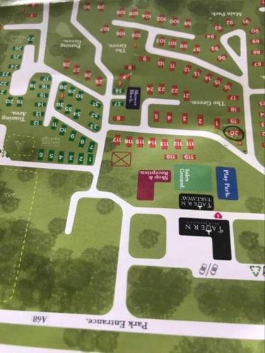 a map of a parking lot with buildings at Travellers Rest Retreat in Oxnam