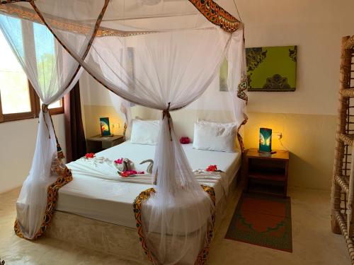 Katil atau katil-katil dalam bilik di Breeze Residence