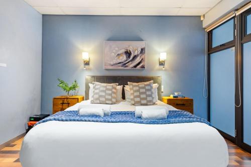 Katil atau katil-katil dalam bilik di Eden On The Bay 68B by Host Agents