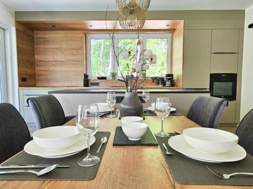 Φωτογραφία από το άλμπουμ του Lychenseevilla mit Seeblick, Wintergarten, Kamin und Sauna σε Lychen