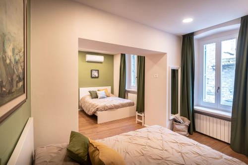 Postel nebo postele na pokoji v ubytování B&B San Gabriele