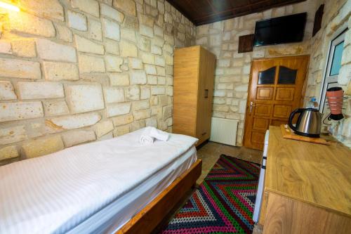 A bed or beds in a room at hotels crazy horse
