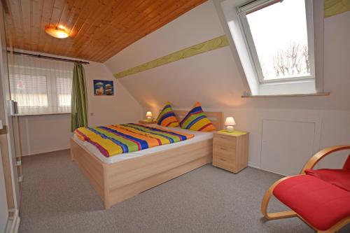 Postel nebo postele na pokoji v ubytování Appartment Vermietung Lütje