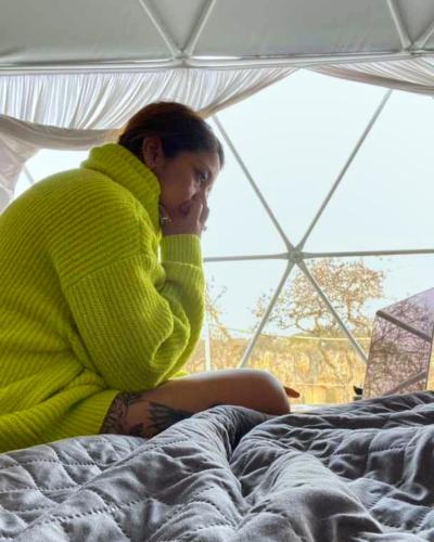 Ένα ή περισσότερα κρεβάτια σε δωμάτιο στο El Gato Glamping con vista a prismas basálticos