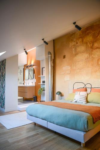 Foto Maison de charme avec Jacuzzi 1