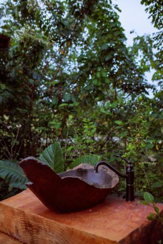 Ein Garten an der Unterkunft Cabana Alecrim com Spa Privativo CAMBORIÚ SC