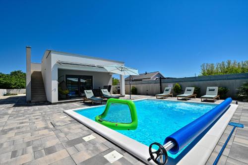 Holiday house Sara with heated pool