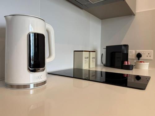 a coffee maker on a counter in a kitchen at Stay and Chill -Luxury Studio in Kato Paphos in Paphos City