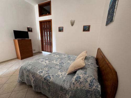 Postel nebo postele na pokoji v ubytování Conte Cavour B&B