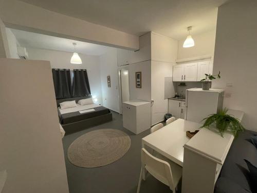 Postel nebo postele na pokoji v ubytování Spanos Apartments - Panteli