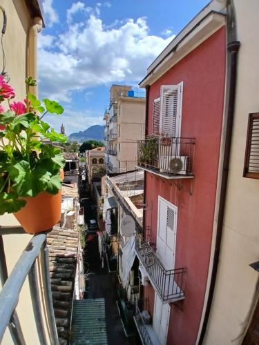 a view of an alley between two buildings at Esse & Emme in Palermo