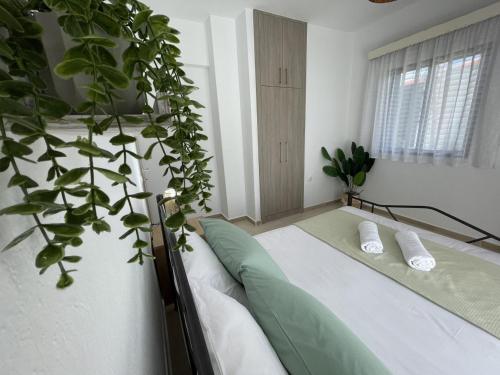 Postel nebo postele na pokoji v ubytování Elfeko Cottage