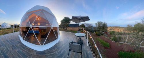 Zahrada ubytování El Gato Glamping con vista a prismas basálticos