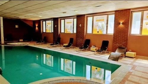 Apartment Wellnessの敷地内または近くにあるプール