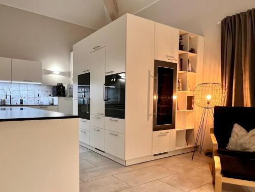 Kuchyň nebo kuchyňský kout v ubytování Retz Garden Loft