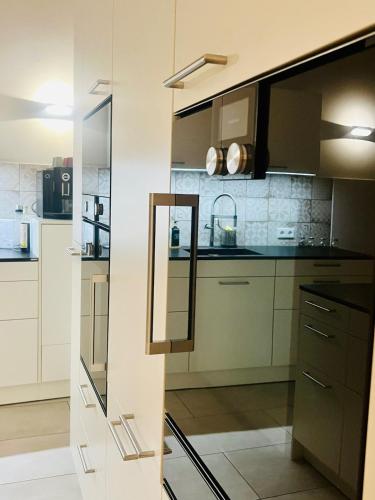 Kuchyň nebo kuchyňský kout v ubytování Retz Garden Loft