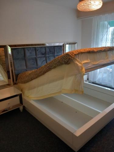 a bunk bed in a room with a window at Airport Basel Apartment in Basel