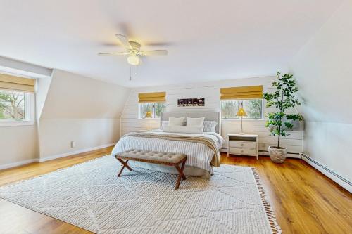 a bedroom with a bed and a ceiling fan at Willow Cove in York