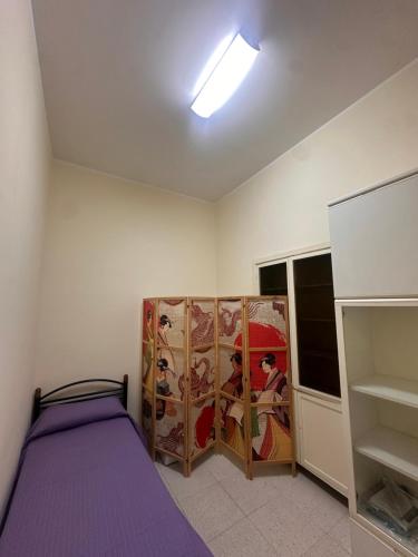 Postel nebo postele na pokoji v ubytování Civico 27 Apartment Fondi